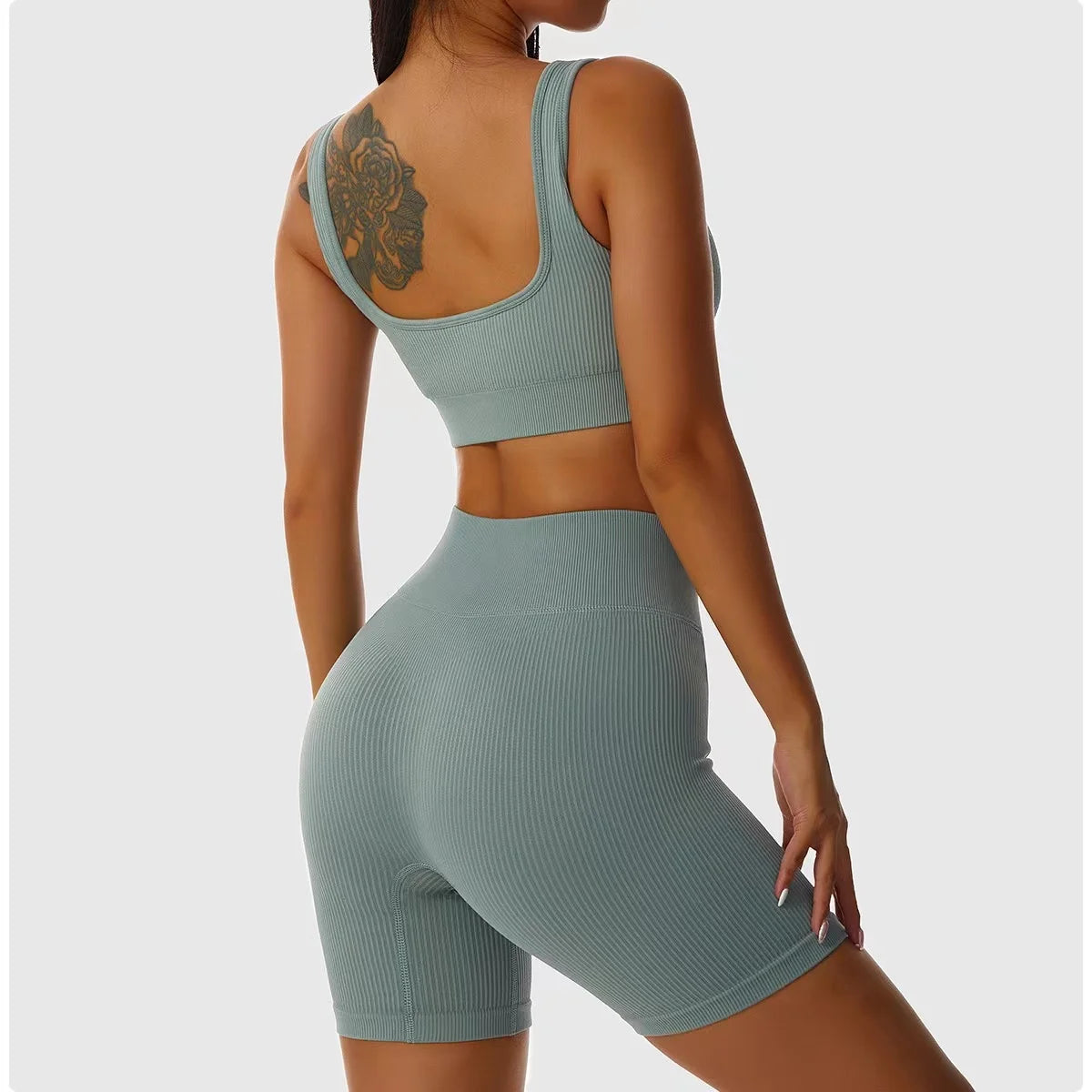 Conjunto de esporte de ioga com nervuras para mulheres sem costura Crop Top Bra Shorts Conjunto de ioga
